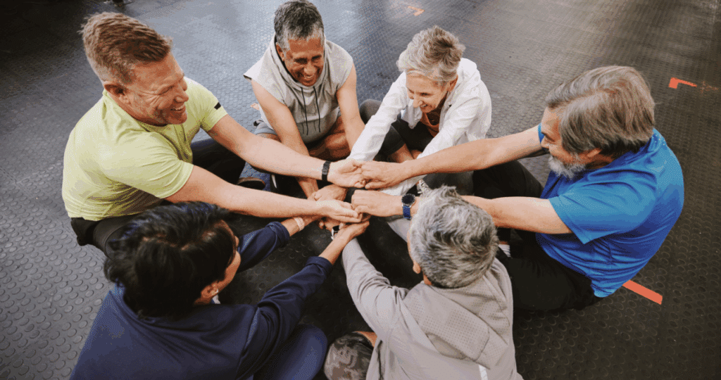 a prayer group holding hands - bible prophecy - janet shindoll